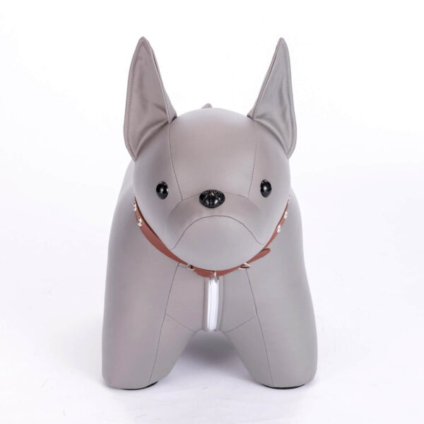 Front shot of gray colored French Bulldog shaped stool, against white background.