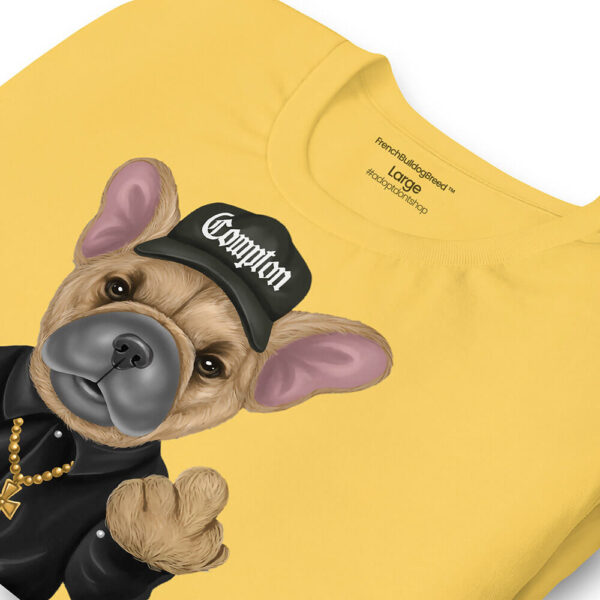 Flat lay close up photo of the yellow "Not Your Average Pup T-shirt" against white background